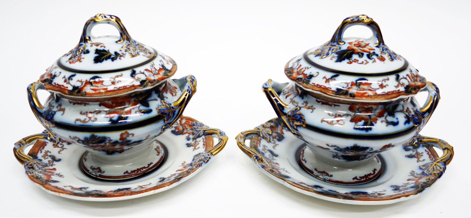 PAIR OF IRONSTONE (?) SAUCE BOATS: Painted with gilt decoration; crazing; normal wear; H- 6 1/2"; G-VG