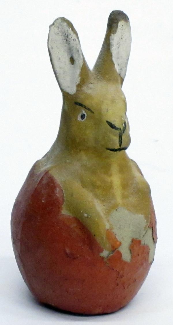 RABBIT CANDY CONTAINER: Papier mache; paint chips missing from egg; missing closure; H-4", G