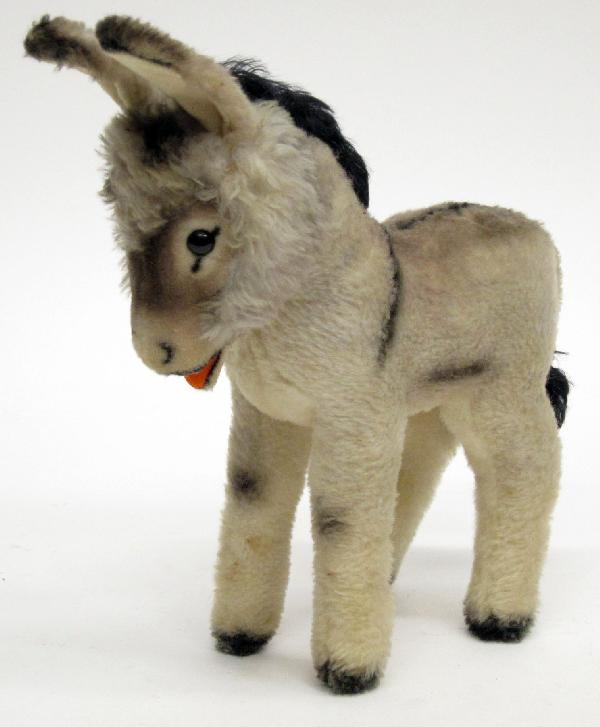 STEIFF DONKEY: Plush, no tags or ear button; glass eyes; shoe button; minor spots and discoloration on fur; L-12", G-VG