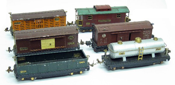 (6) LIONEL TIN PLATE CARS: #813 Cattle, #814 automobile/furniture; #3814 merchandise car, #817 caboose, #815 tank, #812 coal car; overpaint on #814 & #813; L-9", F-G