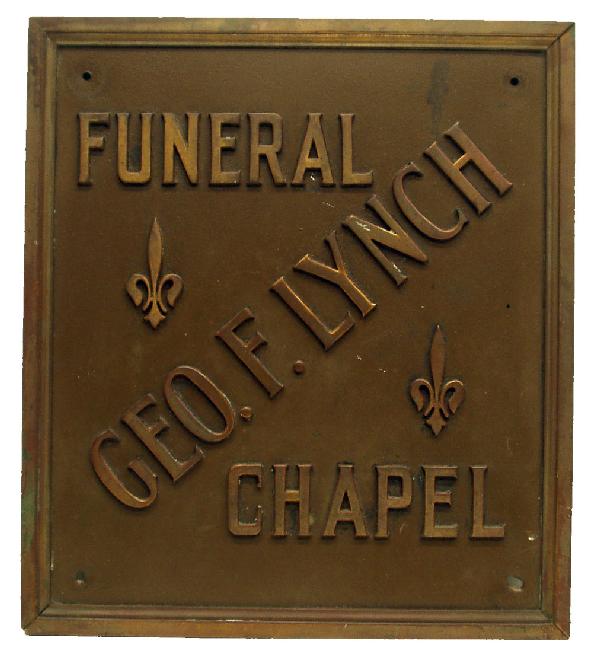 FUNERAL CHAPEL SIGN: "Geo. F. Lynch"; patinated metal with applied letters; some wear; 16" x 18", G