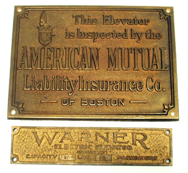 (2) ELEVATOR BRONZE PLAQUES: Embossed lettering; (1) Warner Elec. Elevator, (1) American Mutual Inspection; L-6 1/2" - 7 1/2", VG