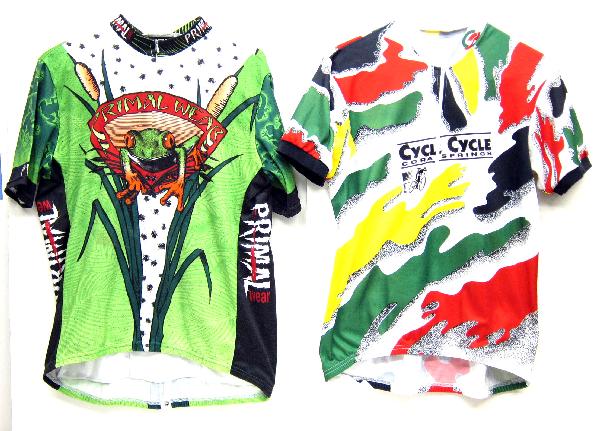(10) CYCLING ADVERTISING SHIRTS: Bike racing shirts from various bicycle races from numerous states, great color and bizarre graphics; mostly polyester; range of sizes from M-XXL, brand names include: Aussie, Primal Wear, Performance
