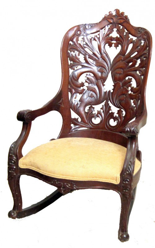 VICTORIAN ROCKER: Walnut, laminate back, ornate leaf carving, foliate carved knuckles and knees; refinished; H-41", W-25", G-VG
