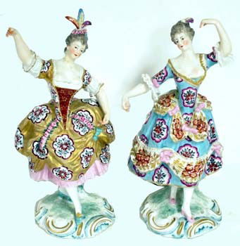 CHELSEA FIGURINES (2): Painted porcelain; gold anchor mark; both have some flakes and (1) neck repair and figner repair; (1) finger loss and feathers missing, H-10", F-G
