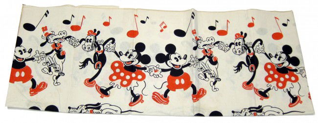 DISNEY MICKEY MOUSE TABLE COVER: Printed paper with original label; Mickey, Minnie, Pluto, Horace, Clarabell, etc.; some browning; 61" x 84", G