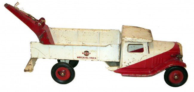 BUDDY-L WRECKING TRUCK: Painted pressed steel; scratches and nicks; minor rust; repainted grill; L-23", G