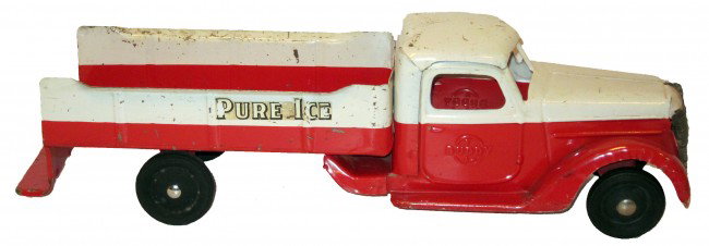 BUDDY-L PURE ICE TRUCK: painted pressed steel; some red over-paint; scratches and nicks; missing partial decal; front grill dented; L-21 1/4",