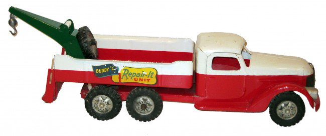 BUDDY-L REPAIR IT UNIT: Painted pressed steel; partially restored and repaitned; a few scratches and nicks; partial decal loss; replacement nut on spare wheel; L-25 1/2", F-G