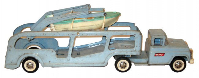 BUDDY-L TRANSPORT: Painted pressed steel and plastic boat; normal wear; L-21", G-VG