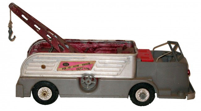 IDEAL FIX-IT TOW TRUCK: Molded plastic and metal; overpaint inside & outside of back; replacement nut on (1) wheel; L-20", P