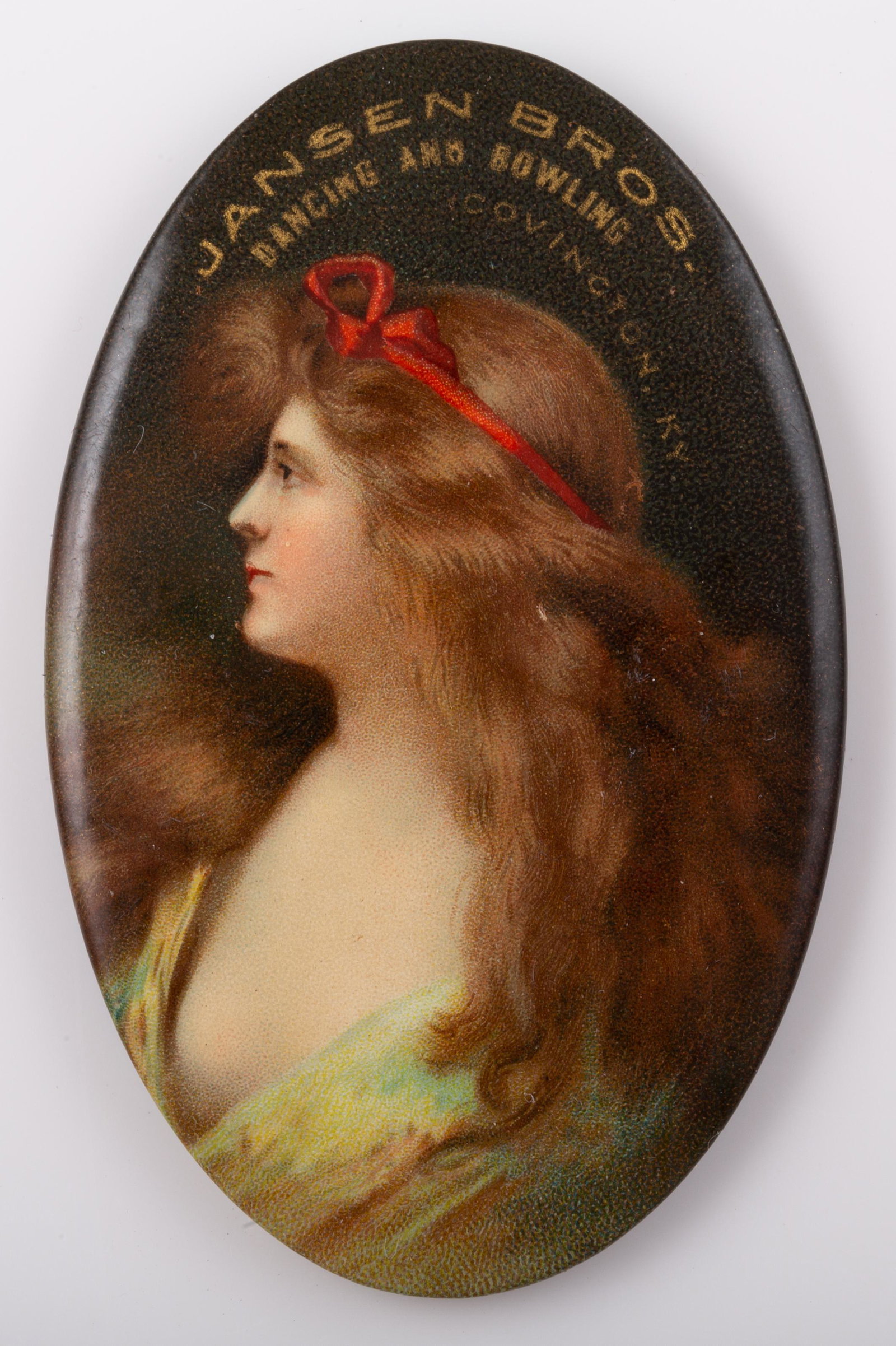 DANCING / BOWLING RELATED POCKET MIRROR: Oval; "Jansen Bros. Dancing and Bowling", "Covington KY", mirror slightly dark; minor scratches; H-2 3/4", VG