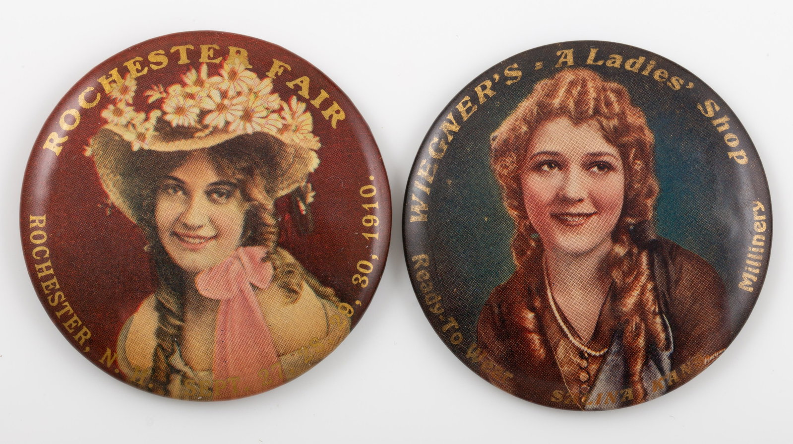 PORTRAIT TYPE POCKET MIRRORS (2): Round; (1) "Wiegner's - a Ladies' Shop", Millinery - Ready to Wear; mirror dark; (1) Rochester Fair, NH 1910; mirror flaking; normal wear; Dia.-2 1/8", G-VG