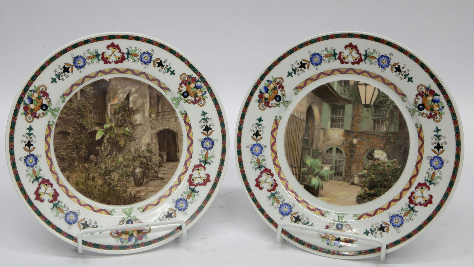 ILLINOIS CENTRAL RAILROAD PLATES (10) PIECES: Porcelain; floral border with transfer photograph centers; (1) arts and crafts patio; (1) Old Grima Home; and (2) 1933 which appear to be older; stamped with R.R. logo in black and red ink; unidentifi