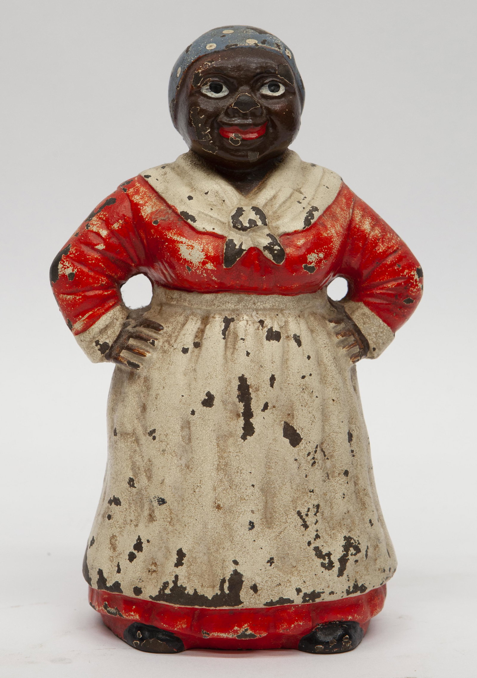 MAMMY DOOR STOP: Painted cast iron; original paint; some paint chips and losses; wear; H- 9"; G-G+