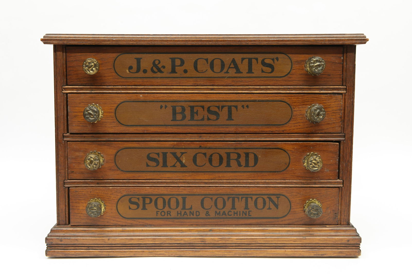 J.P. COATS SPOOL CABINET: (4) drawer; oak; original stencil on front; original finish; H- 15"; W- 21"; VG-EX