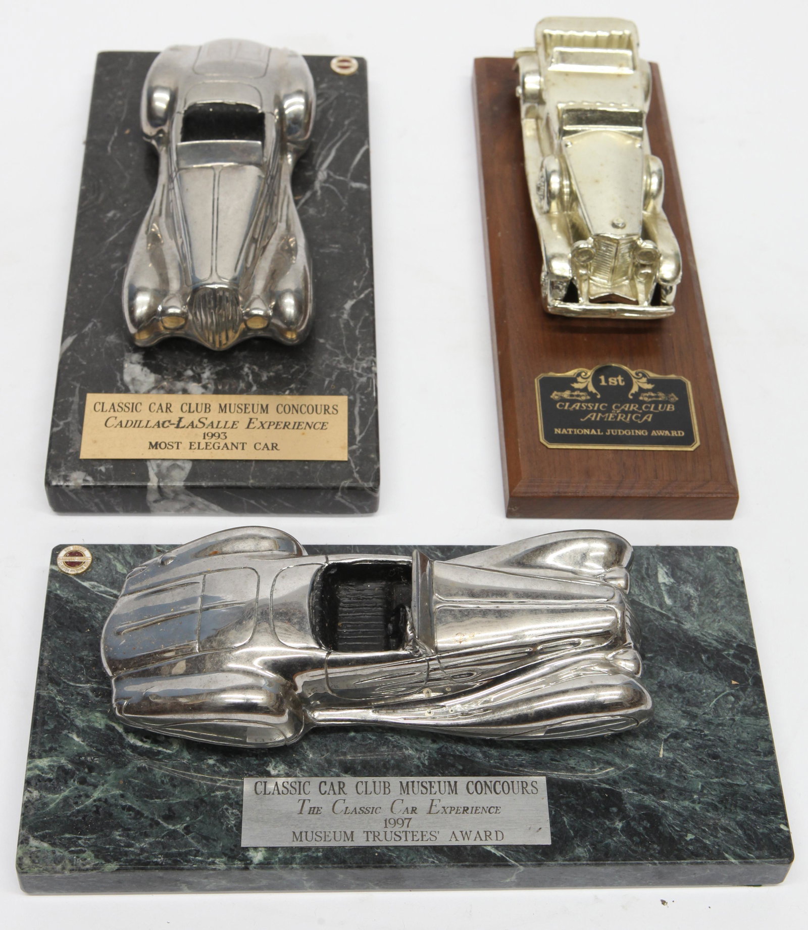 CLASSIC CAR AWARDS (7) PIECES: (6) Don Sommer American Arrow; large and small; (1) Judging Award; normal wear; L- 10"; G-VG