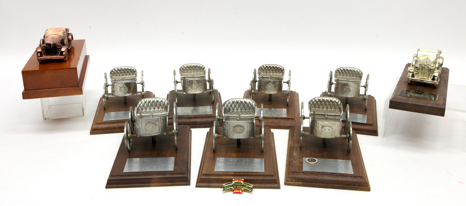 ANTIQUE AUTOMOBILE TROPHIES (9) PIECES: (7) matching cast pewter; Automobile Club of America; (2) cast metal; Judging Awards; normal wear; L- 5" - 6 1/2" (cars); G-VG