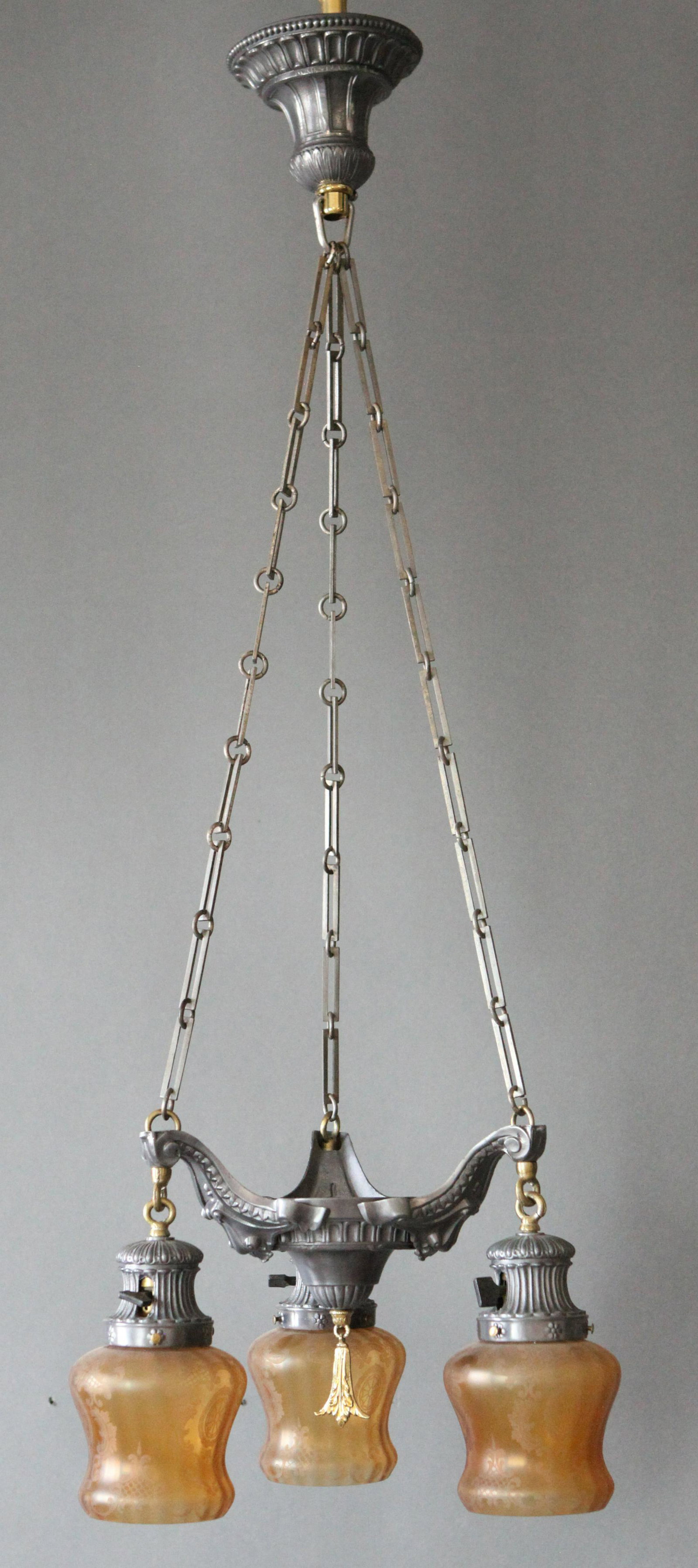 Robert Findlay Ornate Light Fixture w Exceptional Amber Shades: A three arm ceiling light fixture that has been professionally and beatifully restored. Polished and lacquered to great affect with its Britannia metal now shown in a gun metal gray surface with solid