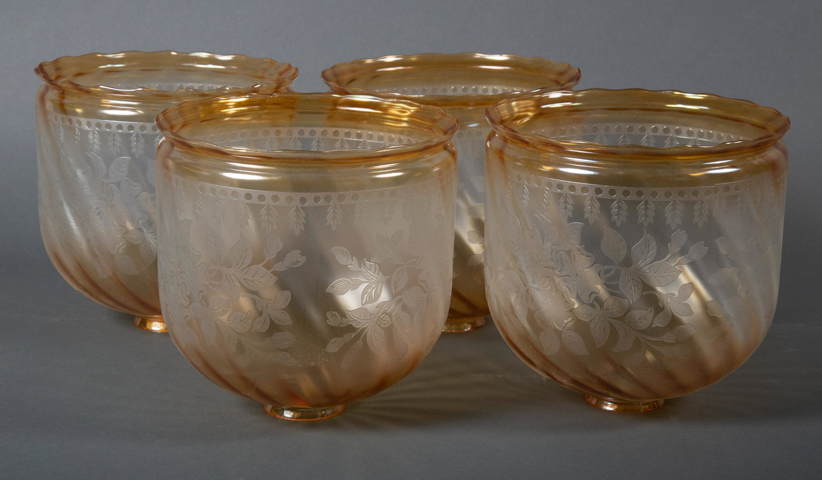 Four Vianne Acid Cut Back & Amber Cognac Flashed Floral Shades: Four French Vianne Edwardian style floral shades with amber cognac flashed rims. Accompanied by original boxes that are dated February 1991. Each measures 7" in diameter and 8" tall with 2 1/4" fitter
