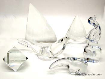 STEUBEN, BACCARAT, GLASS FIGURES: (1) cased set of (2) Steuben sailboats, both have small chips at top of mast; (1) Steuben seal with small bruise in flipper; (1) Baccarat polar bear; (1) Baccarat elephant; (1) Vilca duck; (1) Zodiac 