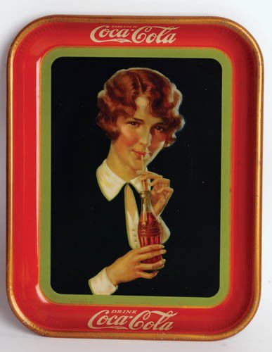 1928 Coca-Cola serving tray for bottle sales: 1928 serving tray for bottle sales High gloss finish with bright colors makes this one really stand out. Some rim chips and some surface scratches, three very tiny red specks touched up. 10 ½"x13 ¼"