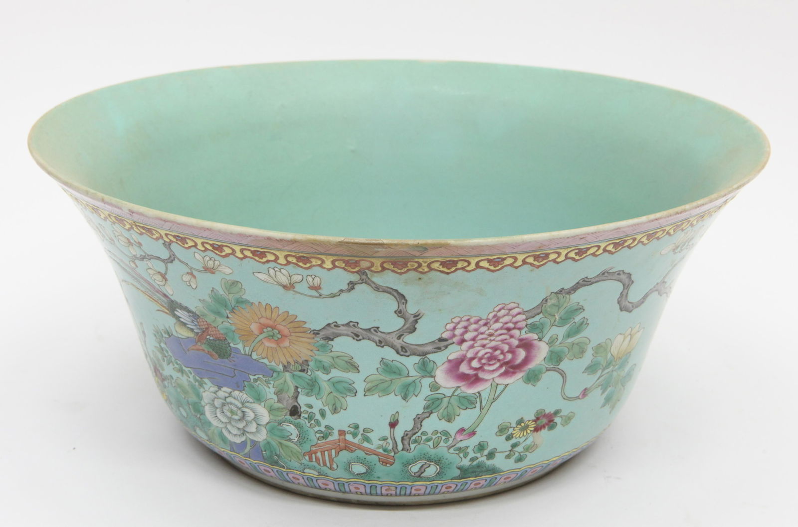 CELADON CENTER BOWL: Painted porcelain; garden scene; normal wear; H-6 1/2", Dia.-15 1/2", G-VG