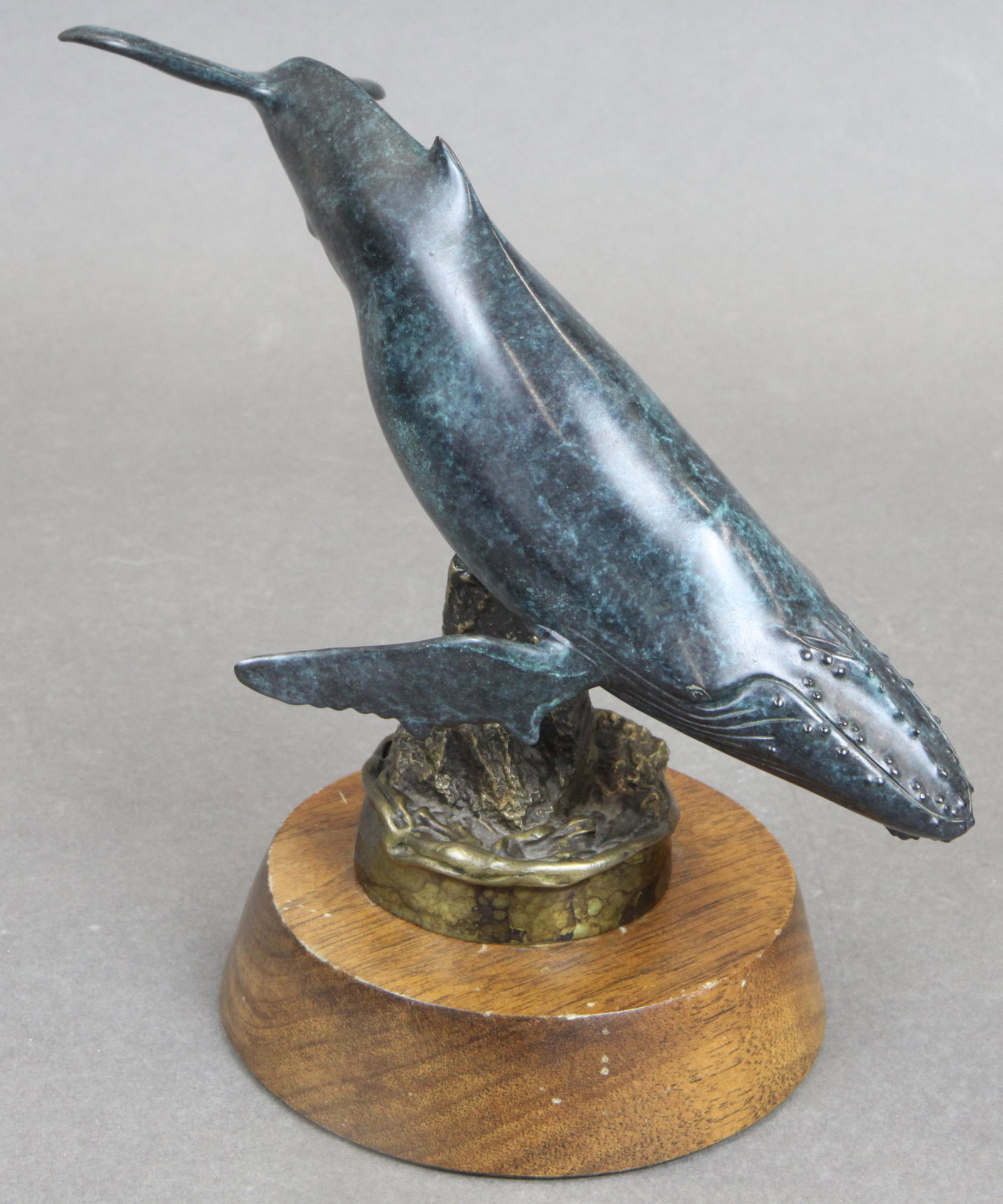 RANDY PUCKET BRONZE WHALE: Cold painted bronze; 66/140 - 2003; on wood base; normal wear; H-8", VG-EX