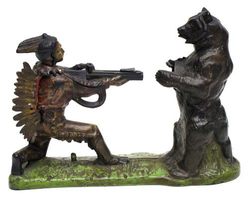 INDIAN BEAR MECHANICAL BANK: Painted cast iron; original feathers; missing trap; repainted base and feathers; paint wear and losses; L-10 1/2", G-G+