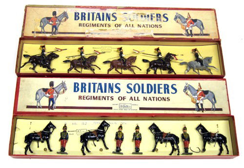 BRITAINS BOXED FIGURES (2) SETS: #182 11th Hussars (8) pieces, #2076 12th Royal Lancers (5) pieces, original boxes, original tie-downs; minor chips, wear and tear on boxes, especially one box; VG-EX