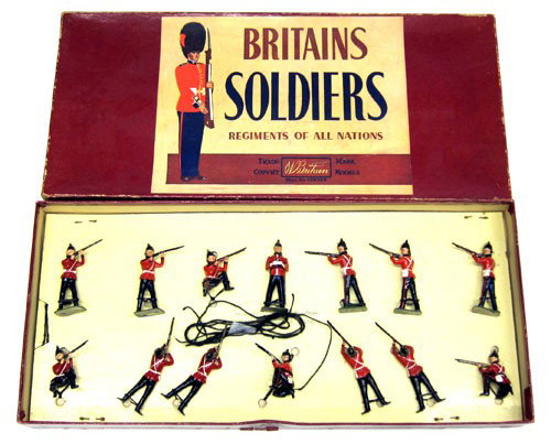 BRITAINS BOXED FIGURES: #2086 Queen's Royal Regiment (14) pieces; original box; original tie-downs; minor box wear and tear; VG-EX