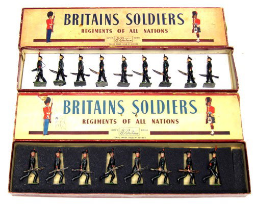 (2) BRITAINS BOXED FIGURES: #98 The King's Royal Rifle Corps, Running (8) pieces; original box; in foam; #2072 Kings Royal Rifle Corps, (9) pieces; original box; new tie-downs; some flaking and box wear and tear; G-VG