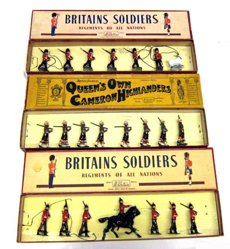 (3) BRITAINS BOXED FIGURES: #74 Royal Welch Fusiliers (7) pieces, #114 Cameron Highlanders (8) pieces, #36 Royal Sussex (7) pieces; original boxes; original tie-downs; very minor flakes; (1) box rough; some wear and tear to boxe