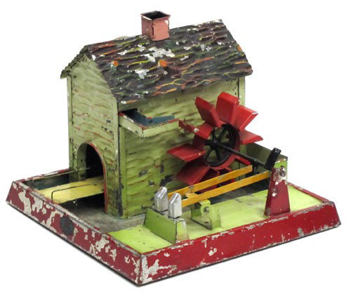 DOLL STEAM ATTACHMENT: Germany mod #706 mill house with pump, water wheel and double trip hammer; painted metal; scratches and paint chips all over; red water wheel may or may not be repainted; H-6 3/4", L-7 1/2", G-VG