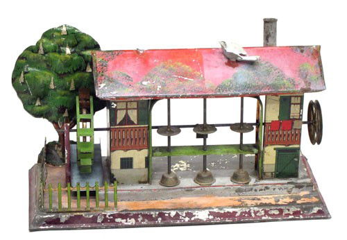 MOHR & KRAUSS STEAM ATTACHMENT: Stamp mill; Germany; painted and litho tin; (3) trip hammers and water wheel; replaced tree; painted loss and wear; missing bird; H-6 1/2", base: 10" x 4 1/2", P-F