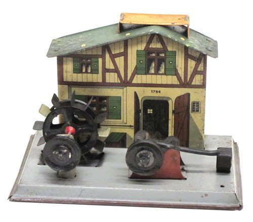 FALK STEAM ATTACHMENT: Germany; mill house with water wheel and trip hammer; litho tin and painted metal; very minor rust and paint wear; H-5", base 7" x 4", G-VG
