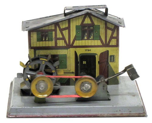 FALK STEAM ATTACHMENT: #286/67 Germany, mill house with waterwheel and trip hammer; litho tin and painted metal; roof repainted; H-5", base 6 1/2" x 4 1/2", G
