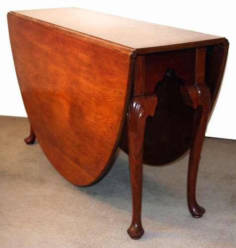 WILLIAM WEAVER QUEEN ANNE TABLE: Walnut, cabinet made, carved shell knees, pad feet; H-29", L-68", VG-EX