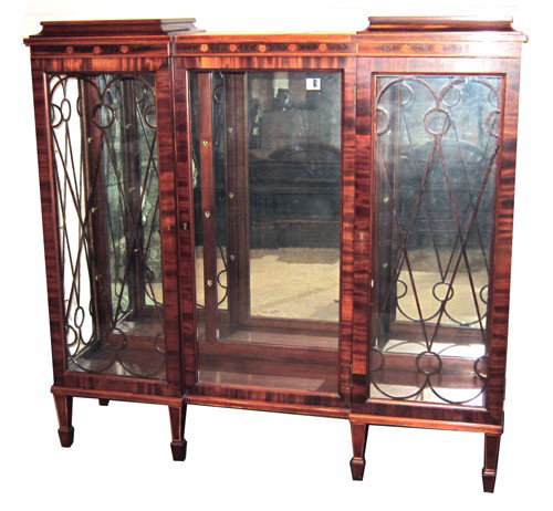 EDWARDIAN DISPLAY CABINET: Mahogany with floral frieze inlay; triple door with middle inset; mirrored back; spade feet; refinished. H-52", L-54"; VG-EX