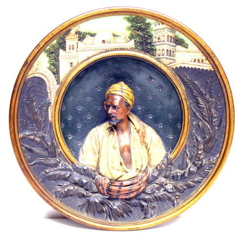 ARABIAN REDWARE WALL PLAQUE: "Musterschutz"; J.M.; 5338; deep wall plaque with relief decoration; minor chips. Depth-2?", Dia-14"; VG-EX