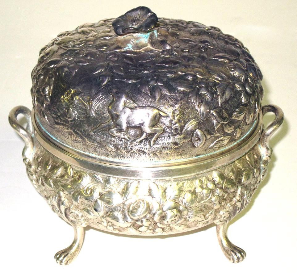A. E. WARNER STERLING REPOUSSE BUTTER DISH: Floral finial, hairy paw feet; has insert; monogrammed; polish wear; 20.5 TO; H-5", G