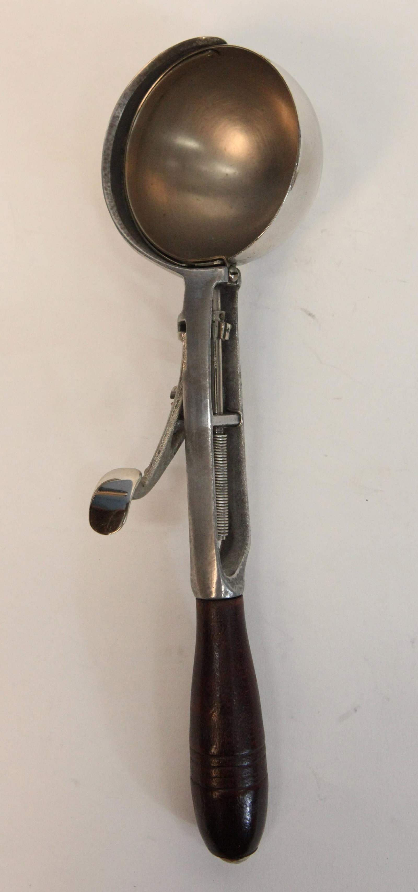 MOSTELLER (?) ICE CREAM SCOOP: Metal with wood handle, Pat July 3 06, flip bowl, normal wear, L-11", G-VG