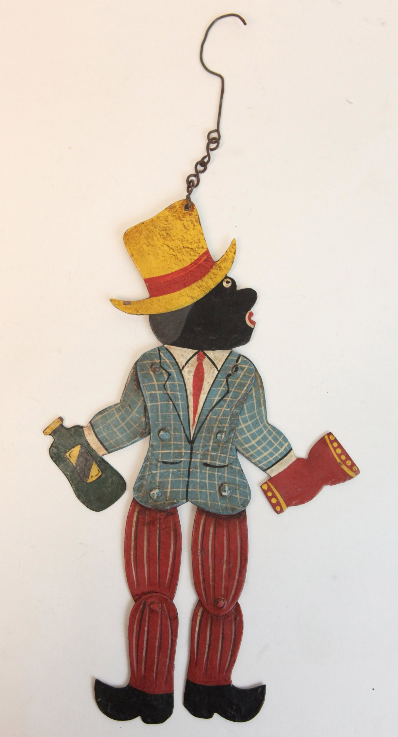 JIGGING TOY: Painted metal cut-out jointed figure; two sided; some in-paint / over-paint; H-11", G-G+