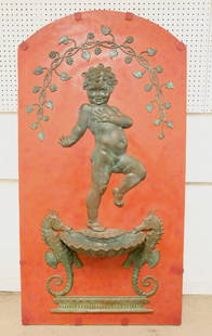 BRONZE WALL FOUNTAIN - EVELYN B. LONGMAN: Evelyn Beatrice Longman (American: 1874-1954). High relief sculpture. Bronze wall fountain c. 1924. Figure of dancing puto and basin with seahorses under decorative leafy surround. Signed "Evelyn B Lo