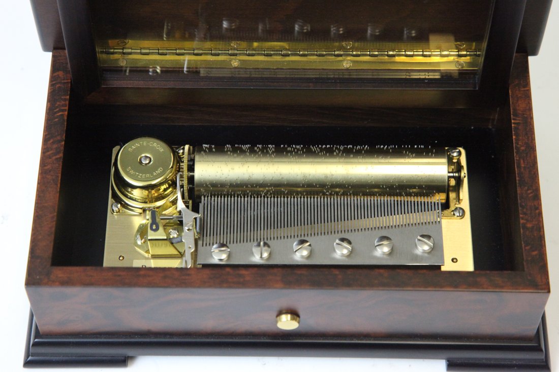 ITALIAN CYLINDER MUSIC BOX: Key wind, plays three songs; "The Blue Danube", "Lara's Theme" and "Edelweiss"; 4 1/2" cylinder; 9" x 5 1/8", EX-NM
