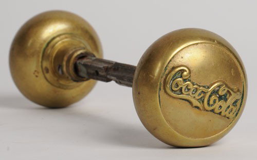 COCA-COLA SET OF BRASS DOOR KNOBS: 1913 to 1915, average to moderate wear with a few small dents on each knob; condition 7.5/VG