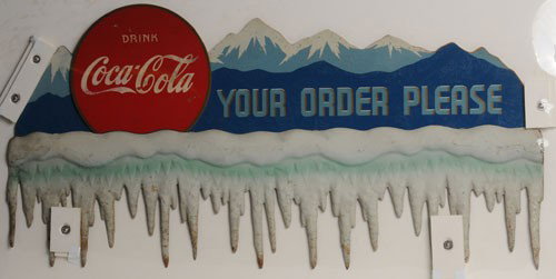 1930'S PLYWOOD AND METAL COCA-COLA FESTOON: The center piece is 36" x 20", the side pieces 36" x 18"; all the heavily embossed icicles are metal, the rest is plywood; probably made by Kay Displays; medium to heavier overall soiling; loss of col