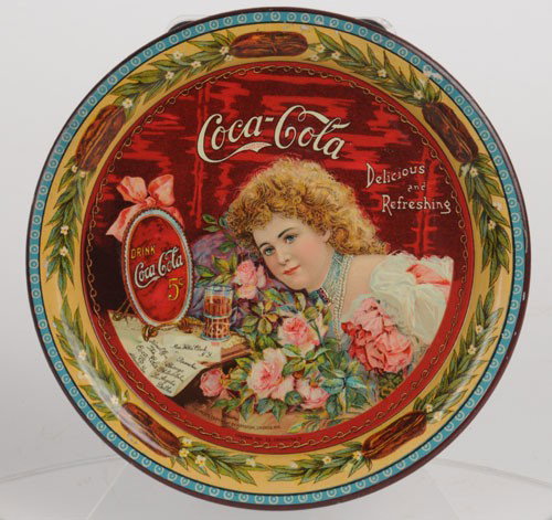 1901 COCA-COLA SERVING TRAY: 9 1/2" diameter; great looking tray with very few chips or nicks even on the outer edges; this tray is slightly dull for whatever reason it has lost a bit of its gloss; and has overall uniform close-p