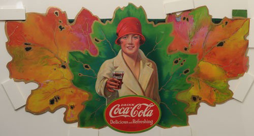 1927 COCA-COLA LEAF FESTOON: Total horizontal extended length would be approximately 11'; includes original paper envelope; great color and condition overall with only a few stronger bends upper left corner of central piece; othe