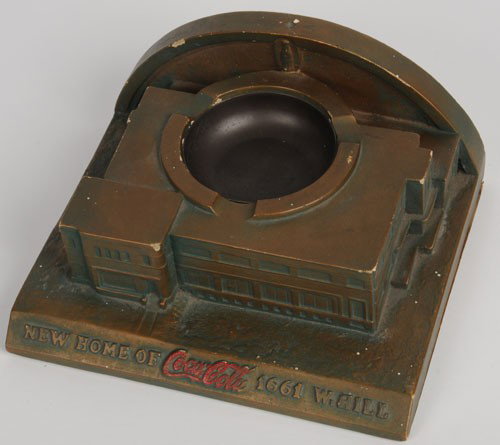 CIRCA 1940'S COCA-COLA CHALKWARE ASHTRAY: 3 3/4" x 8" x 7" deep; commemorates the new home of Coca-Cola at 1661 West Hill, Louisville, KY; a few small nicks and chips, light wear and soiling; condition 8 to 8.5/EX